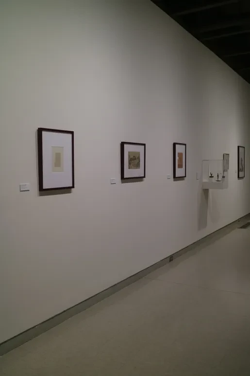 Fresno Art Museum — bronze figure on iron table with figurative paintings