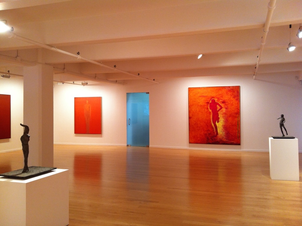 Berggruen Gallery interior with large orange figure paintings and bronze sculptures