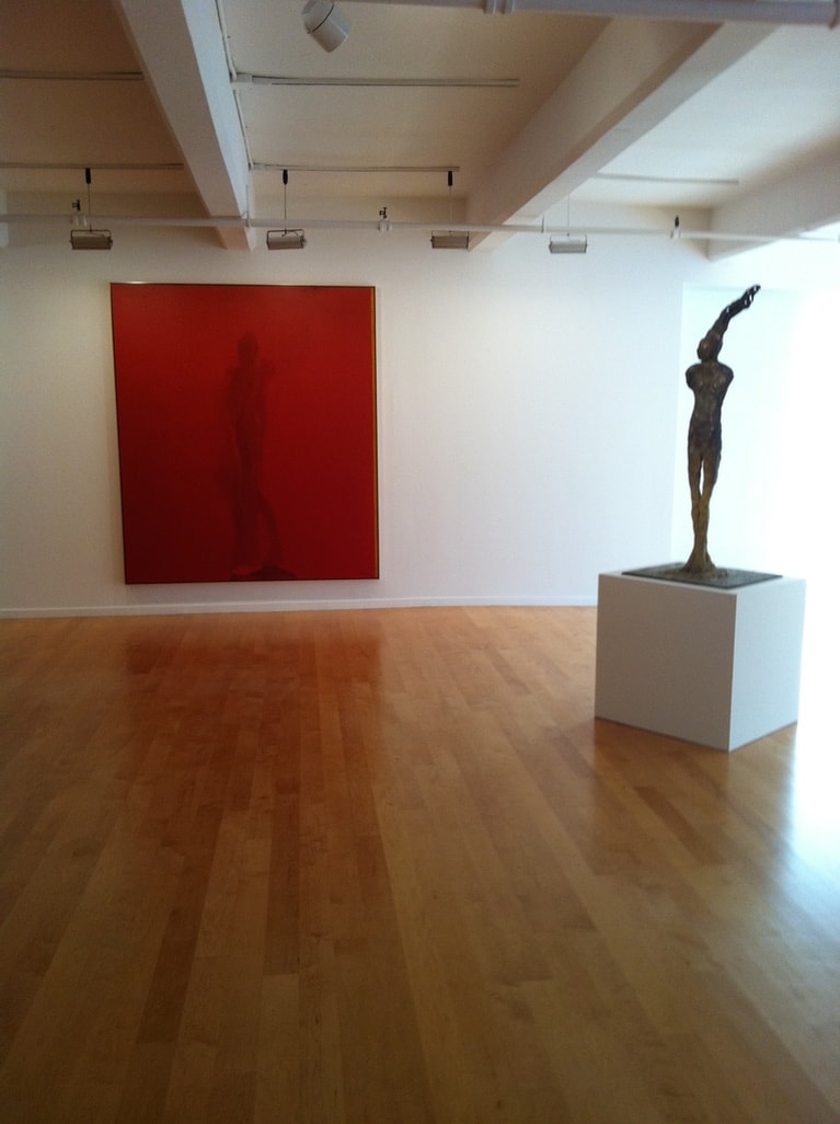 Berggruen Memorial Show — large red canvas with standing figure and bronze sculpture on pedestal