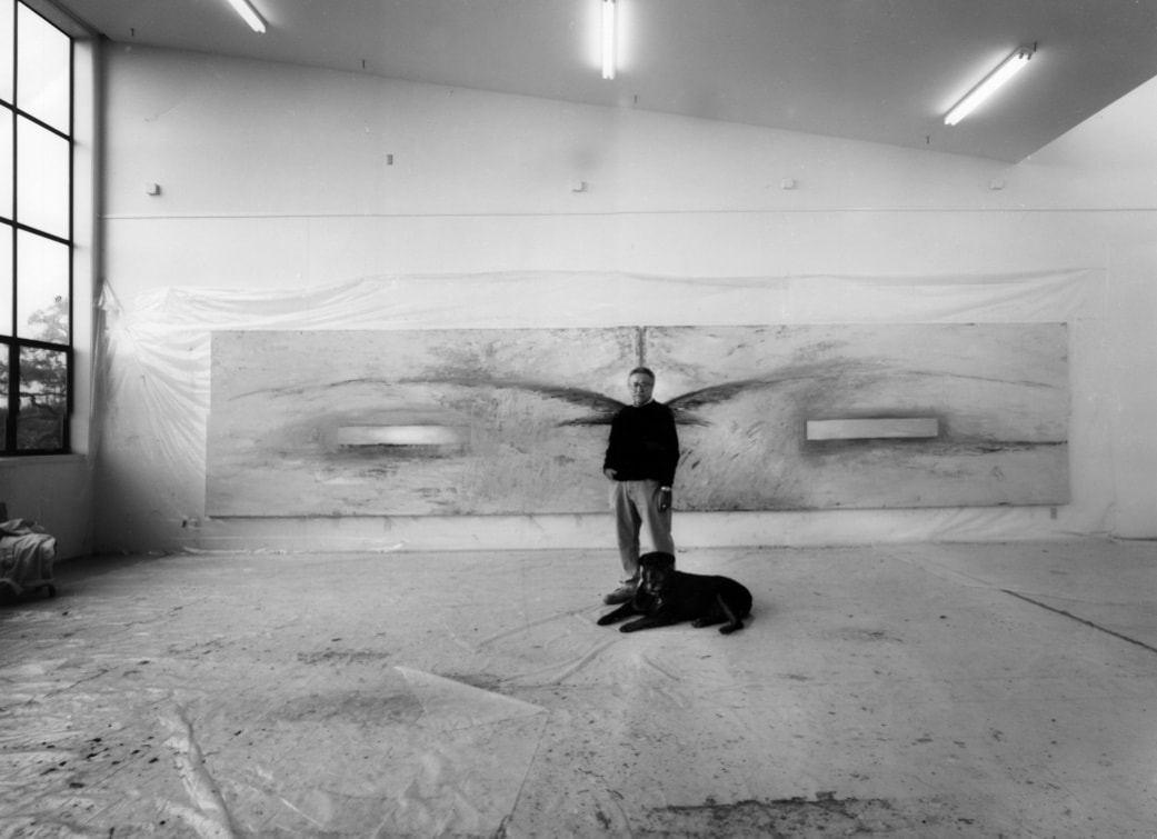 Nathan Oliveira in his studio with large-scale painting and dog